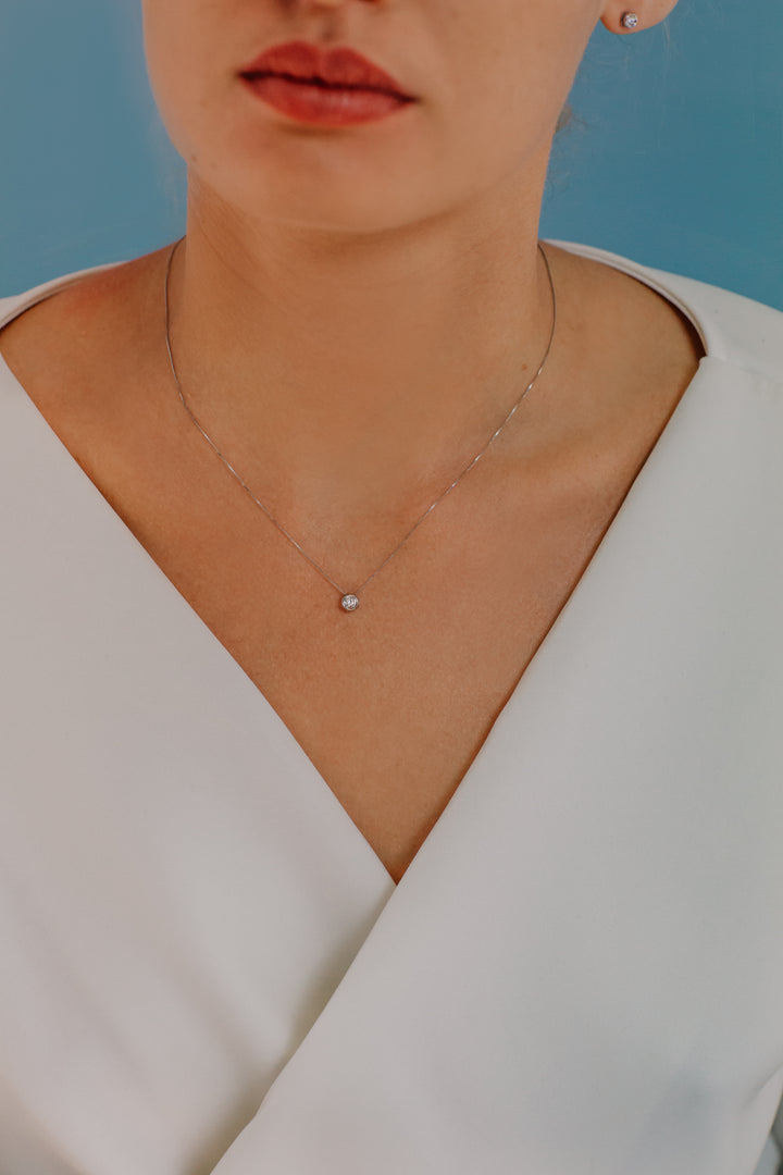 Comete Collana Punto luce tondo in Oro e Diamante GLB1415
