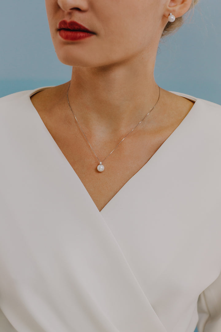 Comete Collana Punto luce Perla in Oro e Diamante GLP585