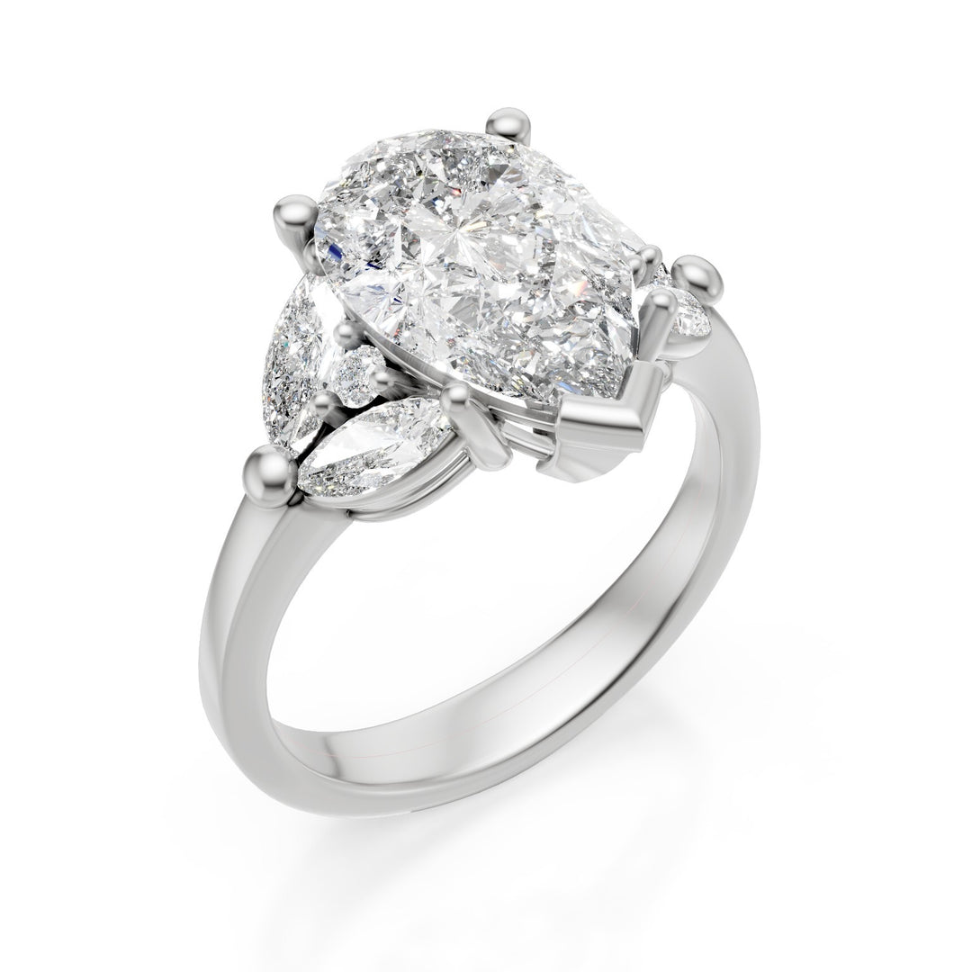 X-Diamond an 18kt lab g.d. ct.tot. 3,54- centr. ct. 3,01 goccia - marquise e round lat ct. 0,53 LXDAPU077O4GOBI354