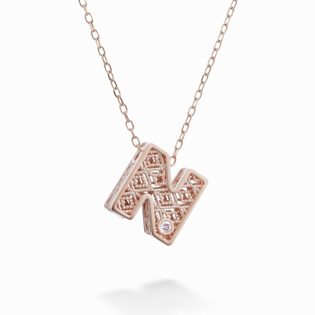 Mikiko cl 18k lettera n oro rosè diam. ct.0,01 MDLETNO3