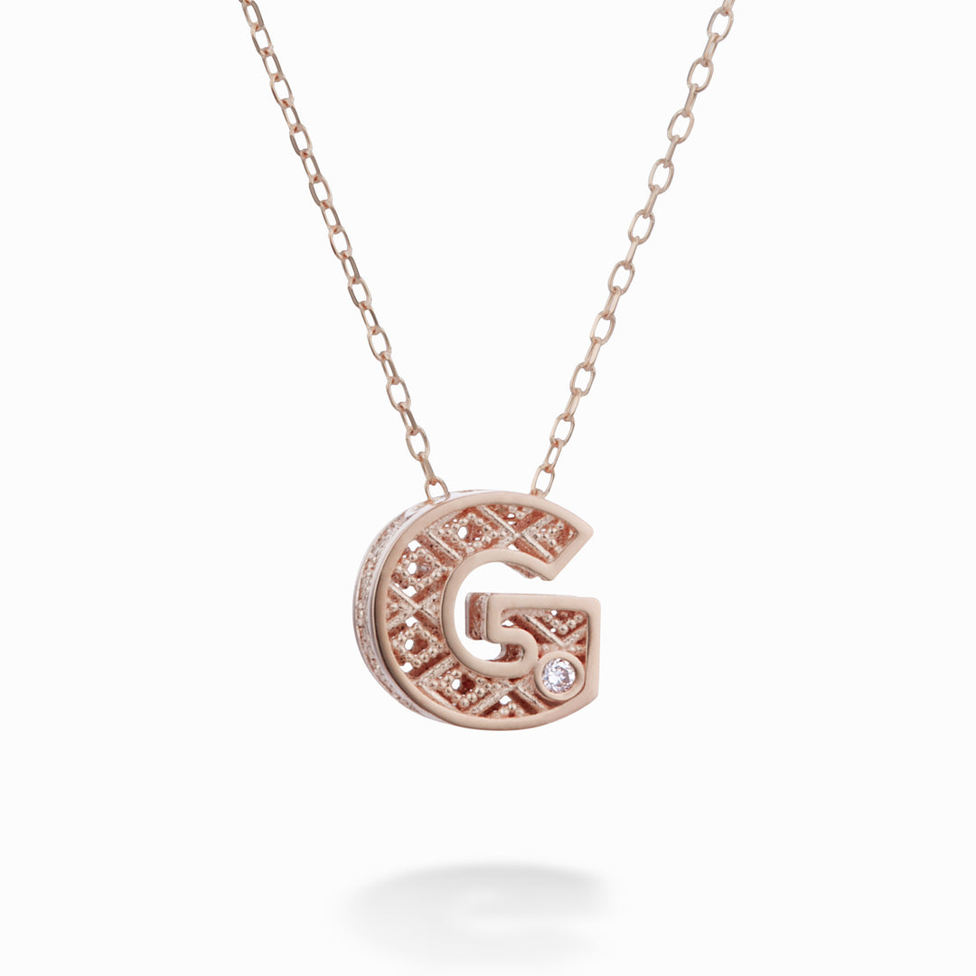 Nihama cl 18k lettera g oro rosè diam. ct.0,01 NDLETGO3