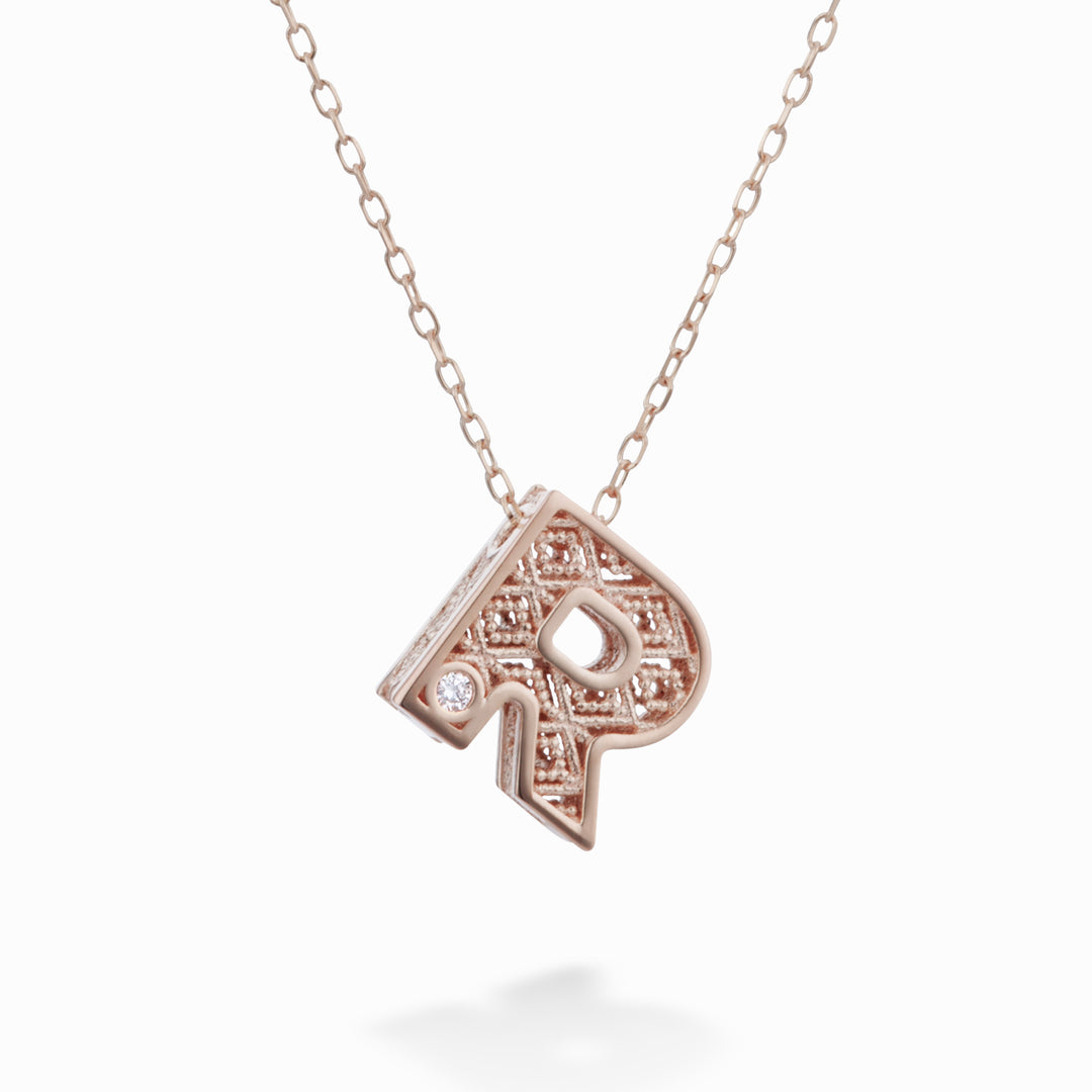 Mikiko cl 18k lettera r oro rosè diam. ct.0,01 MDLETRO3