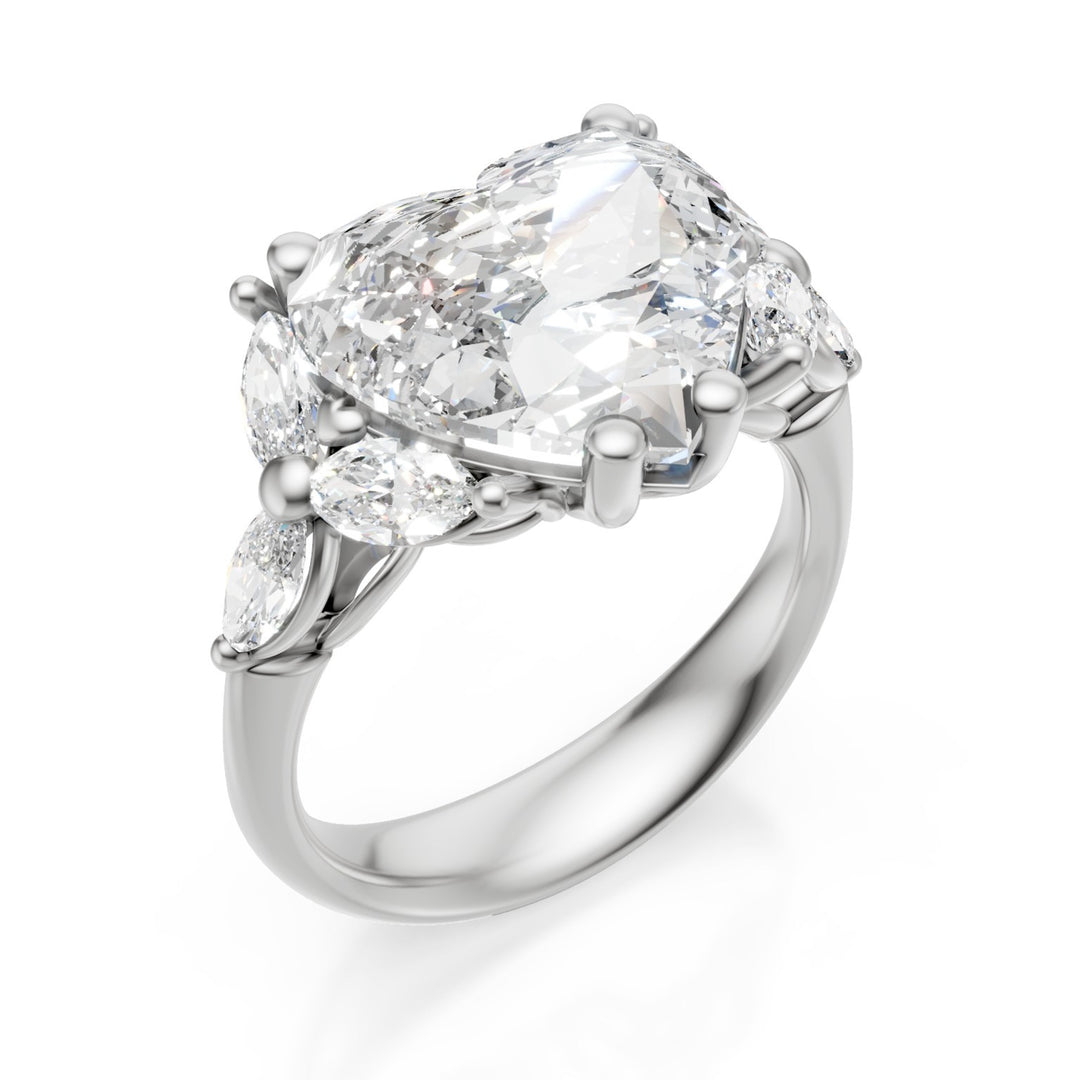 X-Diamond an 18kt lab g.d. ct.tot. 5,75- centr. ct. 5,03 cuore - marquise lat ct. 0,72 LXDAPU073O4CUBI575